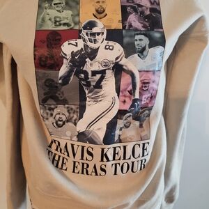 Travis Kelce "The Eras Tour" Themed Graphic Gildan Heavy Blend Cream Sweatshirt